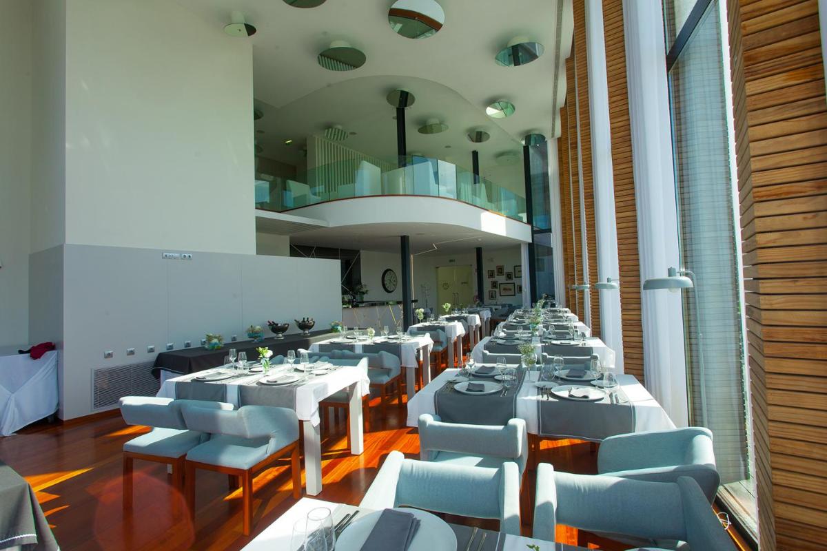 Uma área de estar em Tempus Hotel & Spa