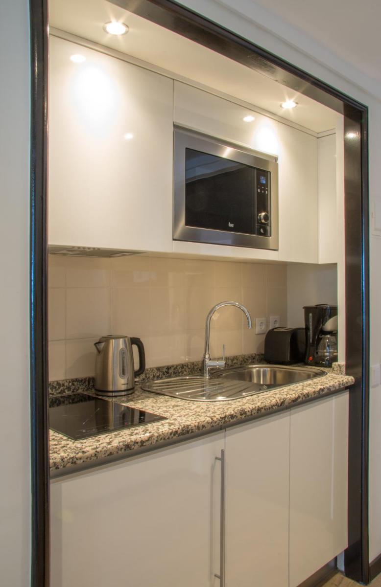 A cozinha ou kitchenette de Pestana Madeira Beach Club