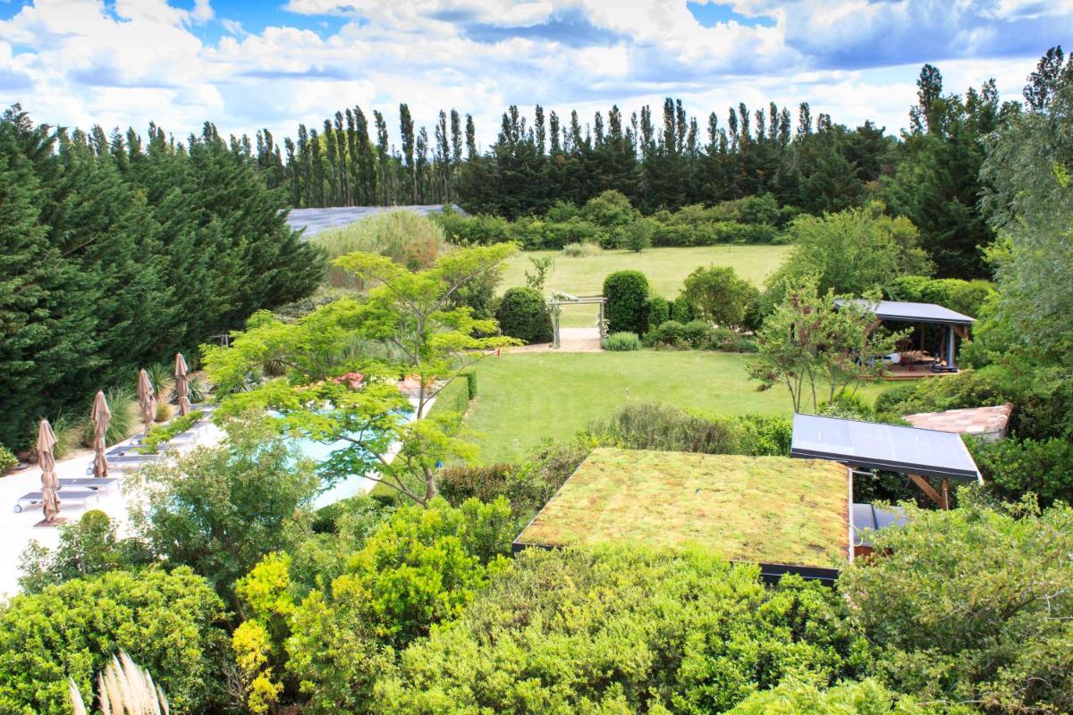 Jardin de l'établissement Les Carmes and spa