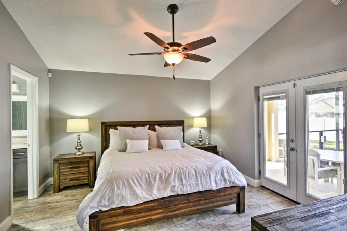 Suitetrails - Mickeys Landing - Luxurious 4BR with 2 Master Suites, Privacy Fenced Pool & Hot Tub BBQ Game RM 2 miles to Disney!
