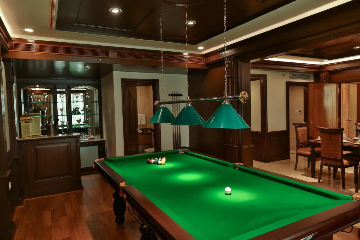 a billiard room with a green pool table at The Accord Metropolitan in Chennai