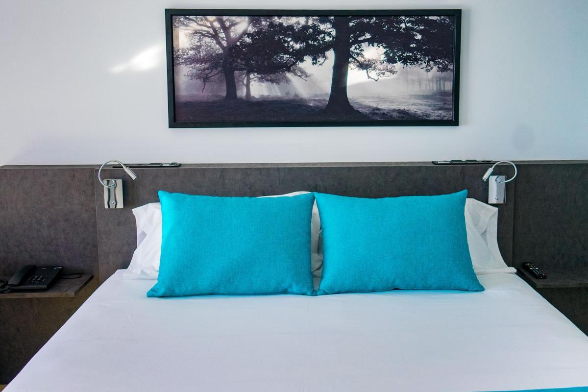 Cama o camas de una habitación en Moon Hotel & SPA.