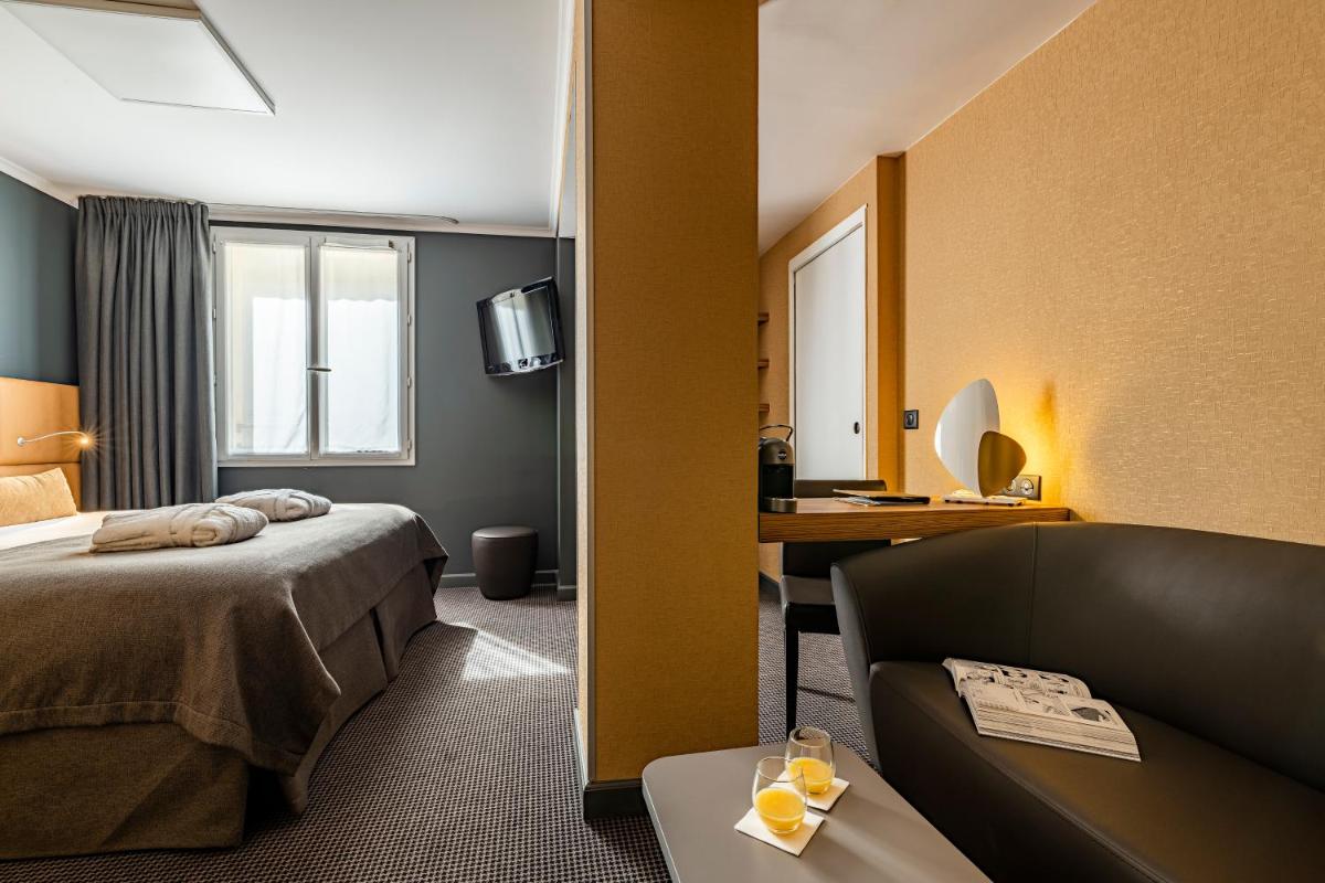 Un ou plusieurs lits dans un hébergement de l'établissement Hotel Residence Europe & Spa