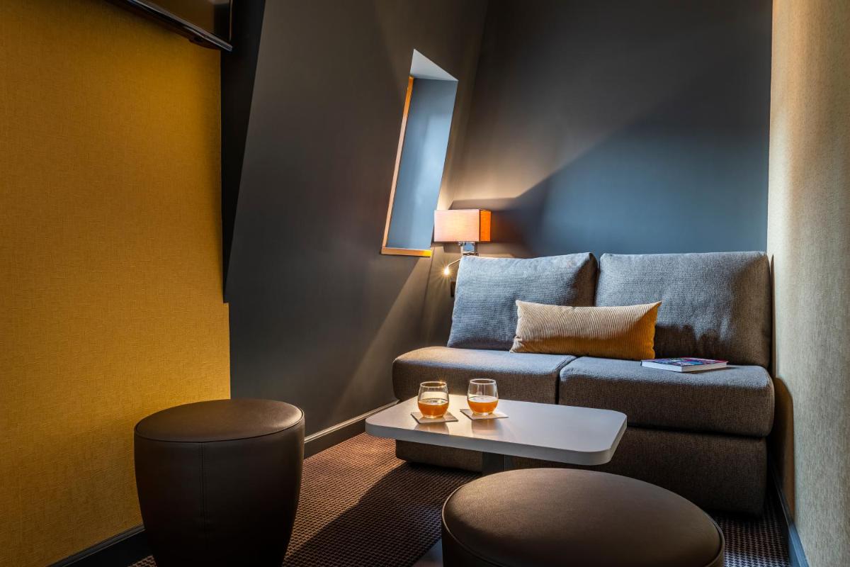 Coin salon dans l'établissement Hotel Residence Europe & Spa