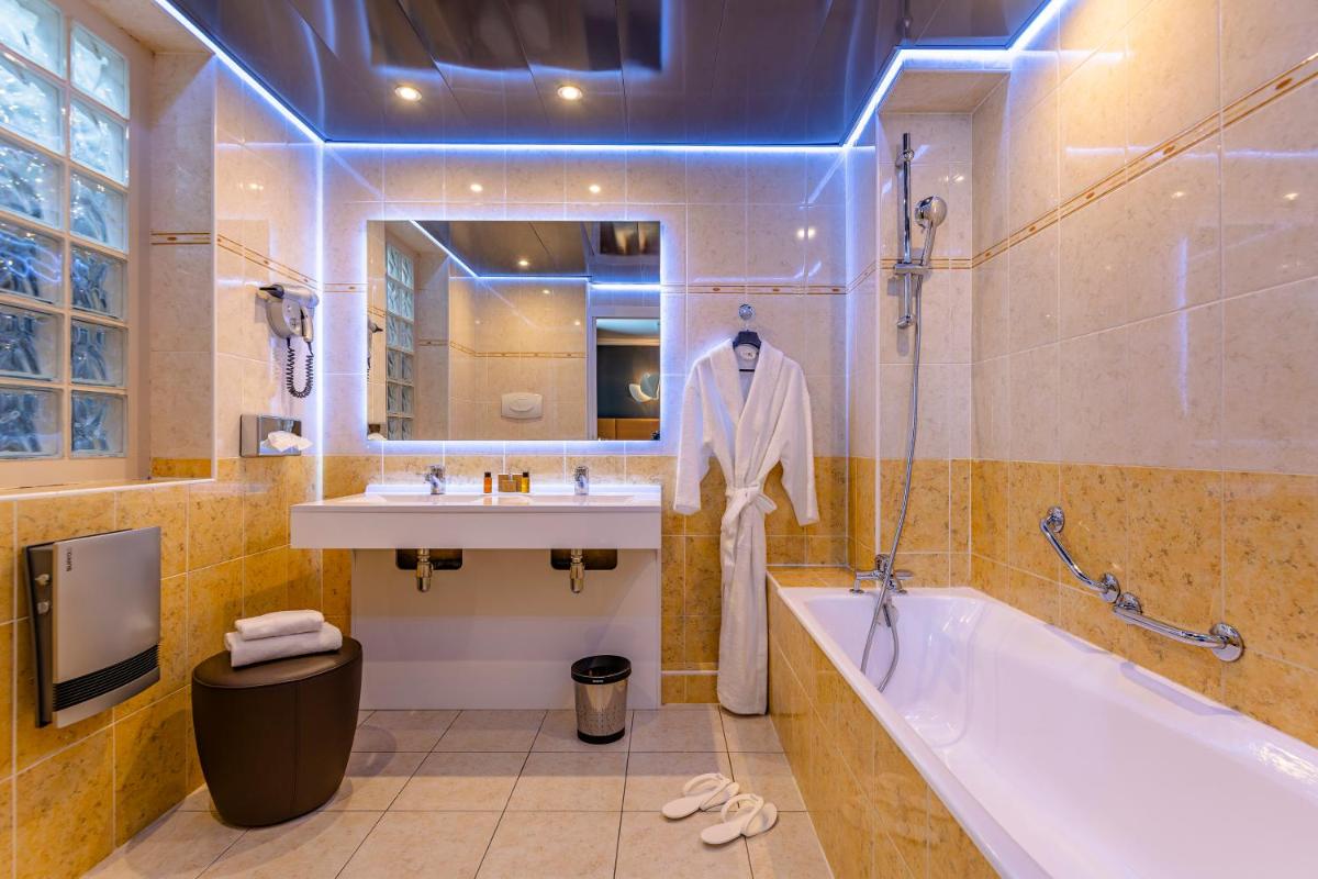 Salle de bains dans l'établissement Hotel Residence Europe & Spa