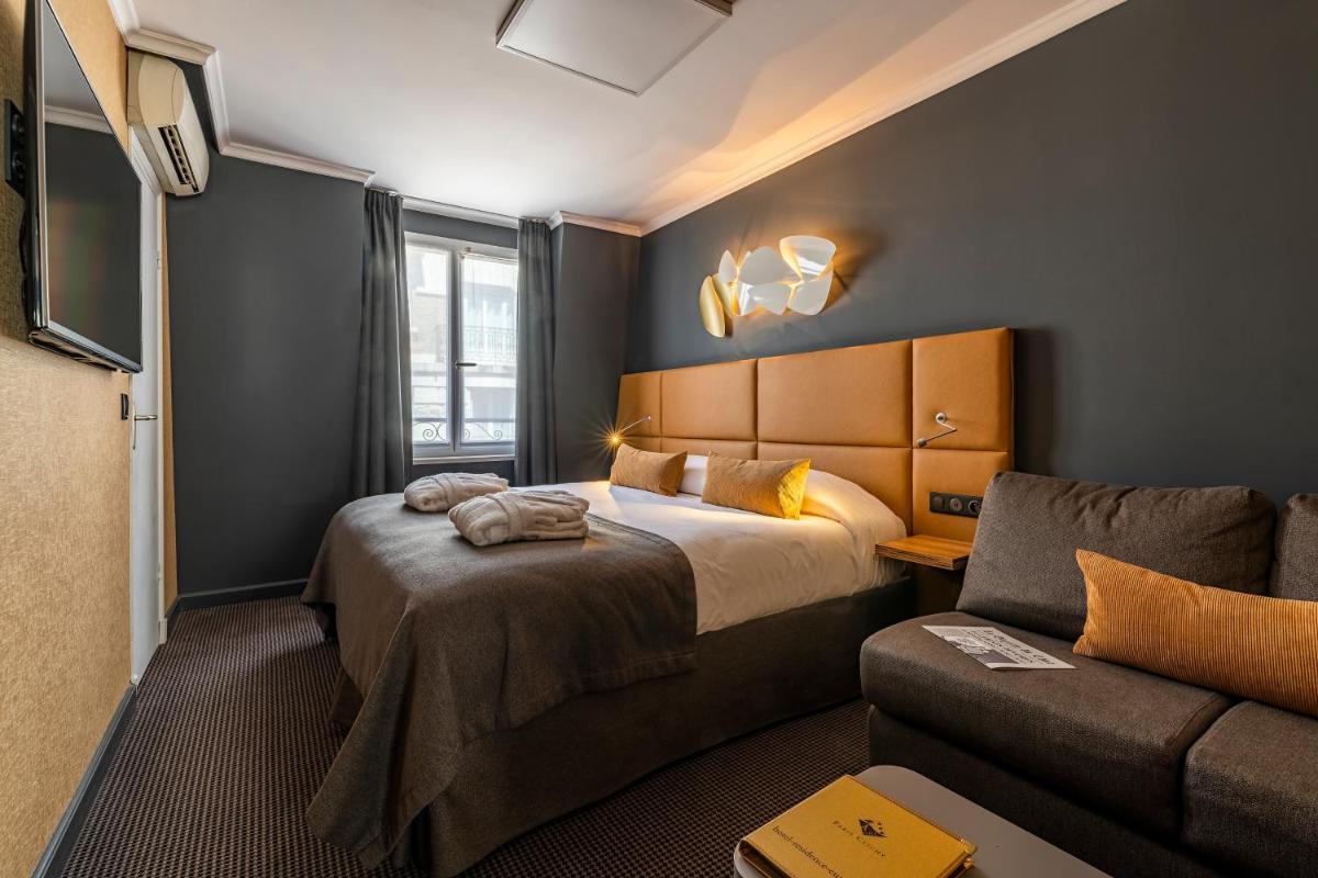 Un ou plusieurs lits dans un hébergement de l'établissement Hotel Residence Europe & Spa