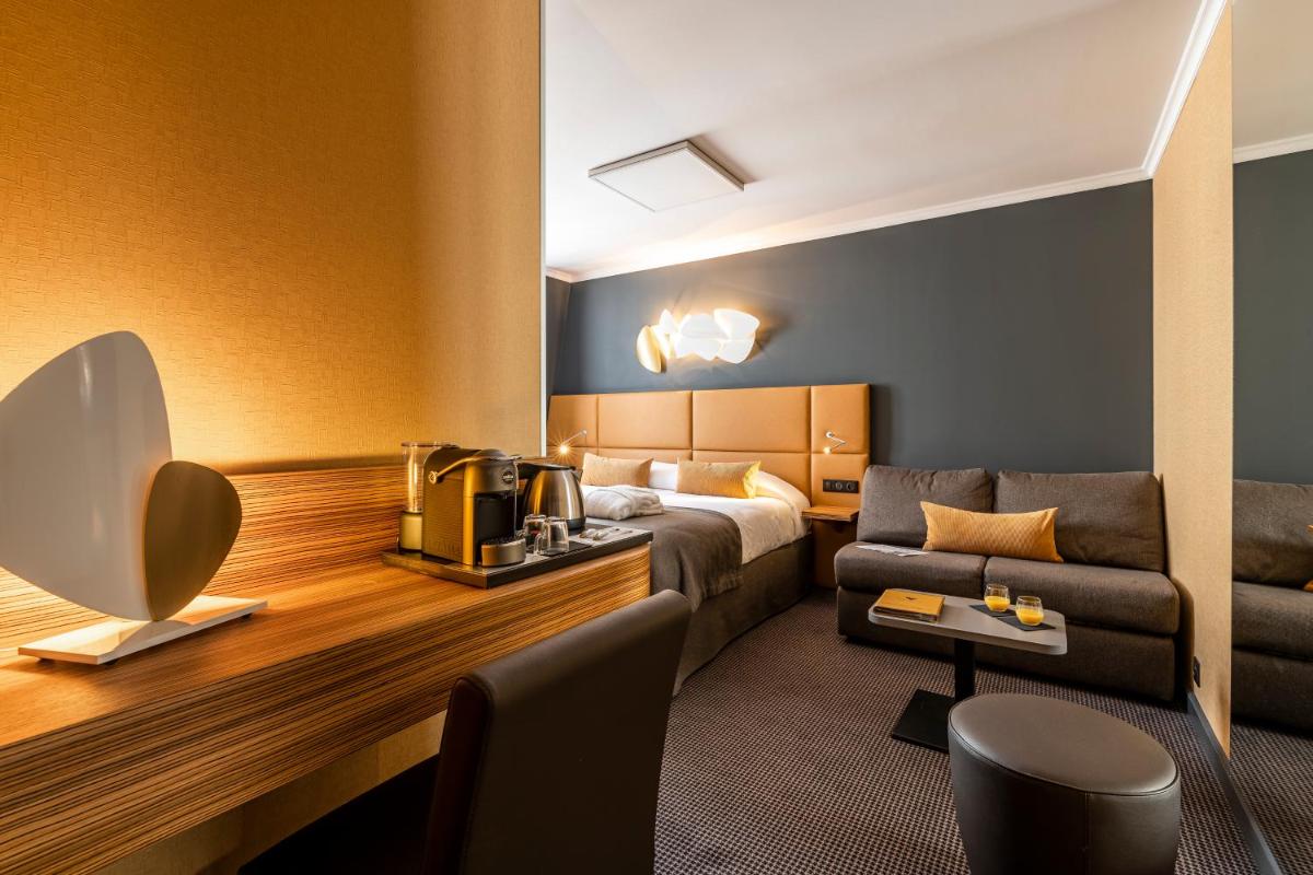 Coin salon dans l'établissement Hotel Residence Europe & Spa
