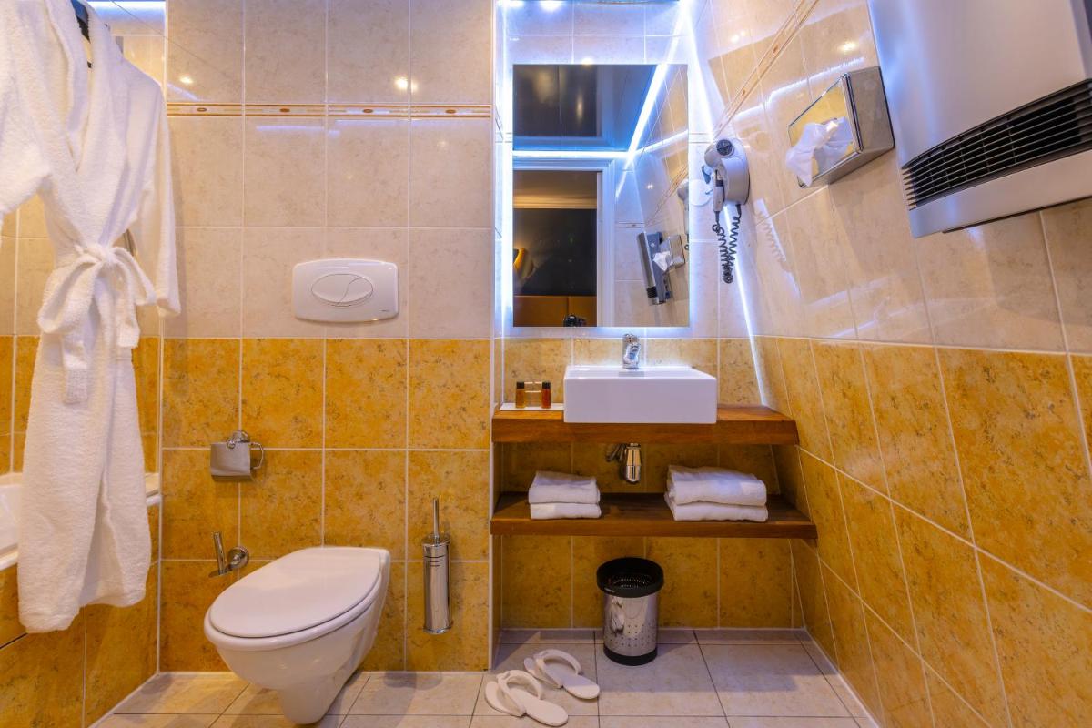 Salle de bains dans l'établissement Hotel Residence Europe & Spa