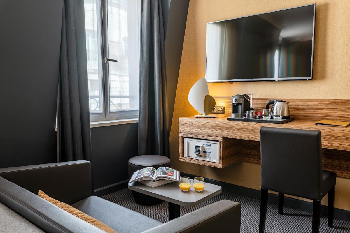 Télévision ou salle de divertissement dans l'établissement Hotel Residence Europe & Spa
