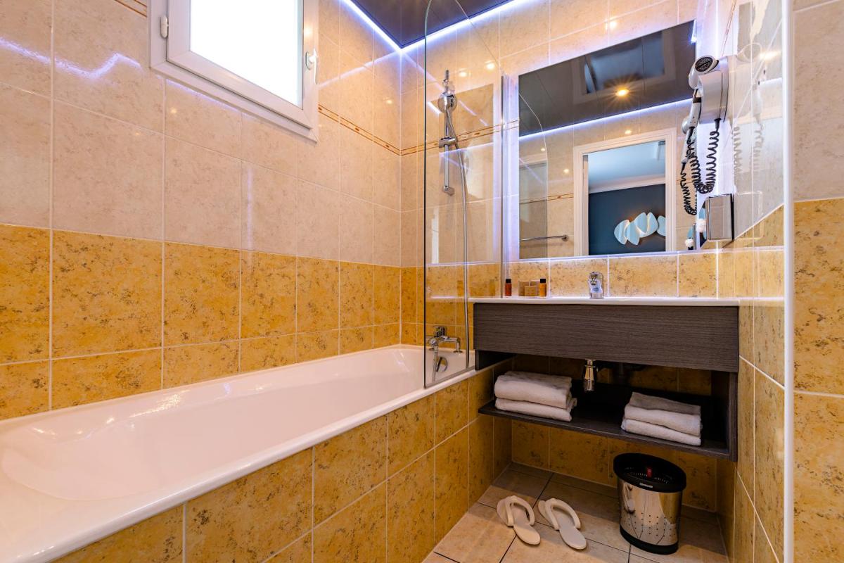 Salle de bains dans l'établissement Hotel Residence Europe & Spa