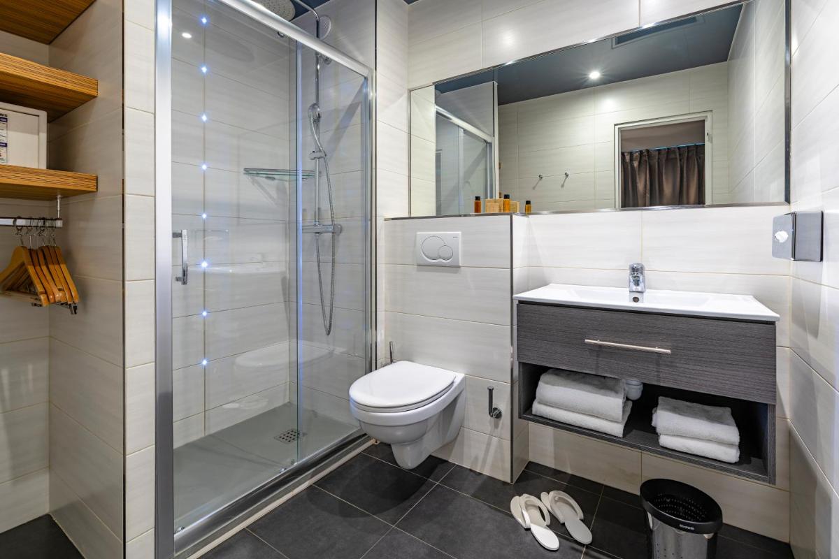 Salle de bains dans l'établissement Hotel Residence Europe & Spa