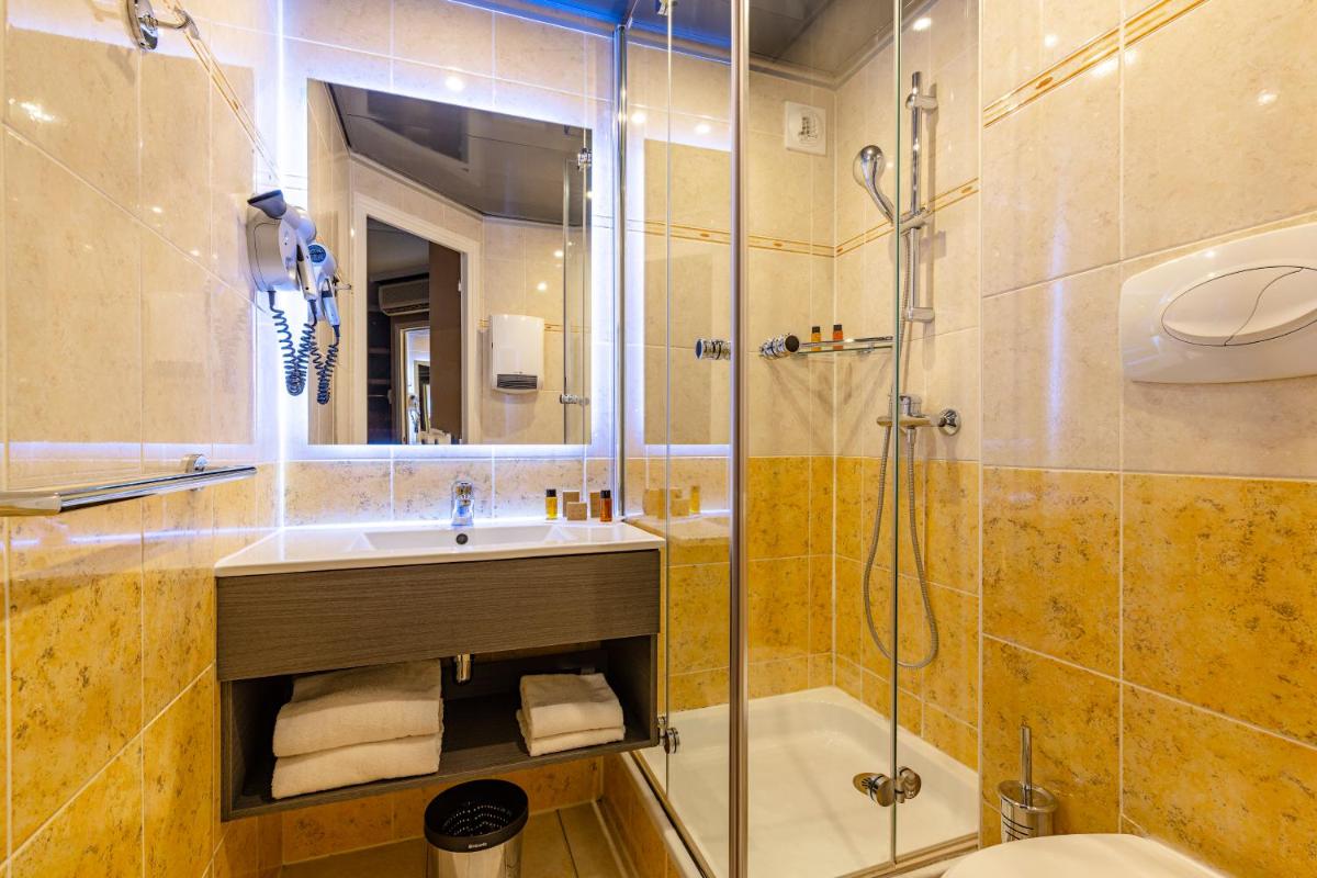 Salle de bains dans l'établissement Hotel Residence Europe & Spa
