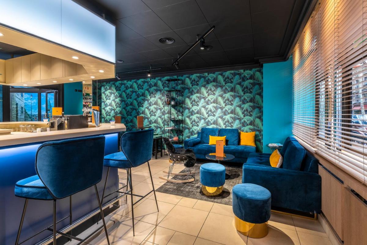 Coin salon dans l'établissement Hotel Residence Europe & Spa