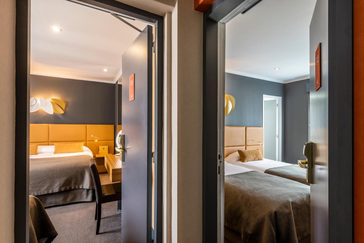 Un ou plusieurs lits dans un hébergement de l'établissement Hotel Residence Europe & Spa