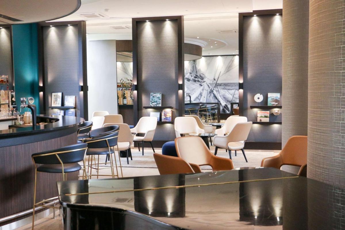 Coin salon dans l'établissement Best Western Plus Hotel Admiral