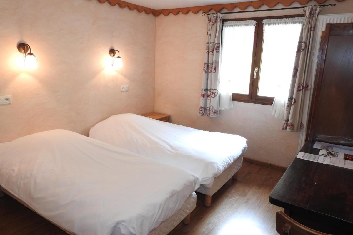 Un ou plusieurs lits dans un hébergement de l'établissement Hôtel Belalp