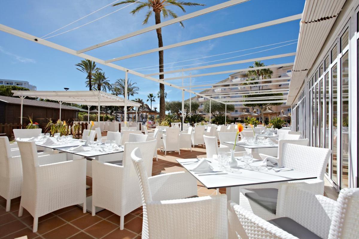 Un restaurante o sitio para comer en Grupotel Port D´Alcudia