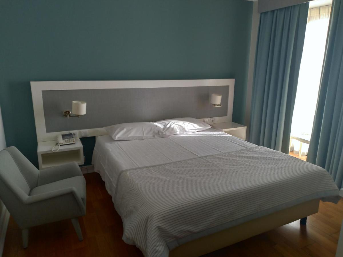 Uma cama ou camas num quarto em Grande Hotel das Caldas da Felgueira