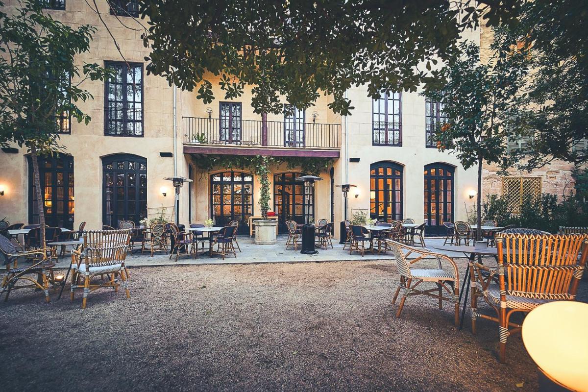 Un restaurante o sitio para comer en Can Bordoy Grand House Hotel GL Preferred Hotel