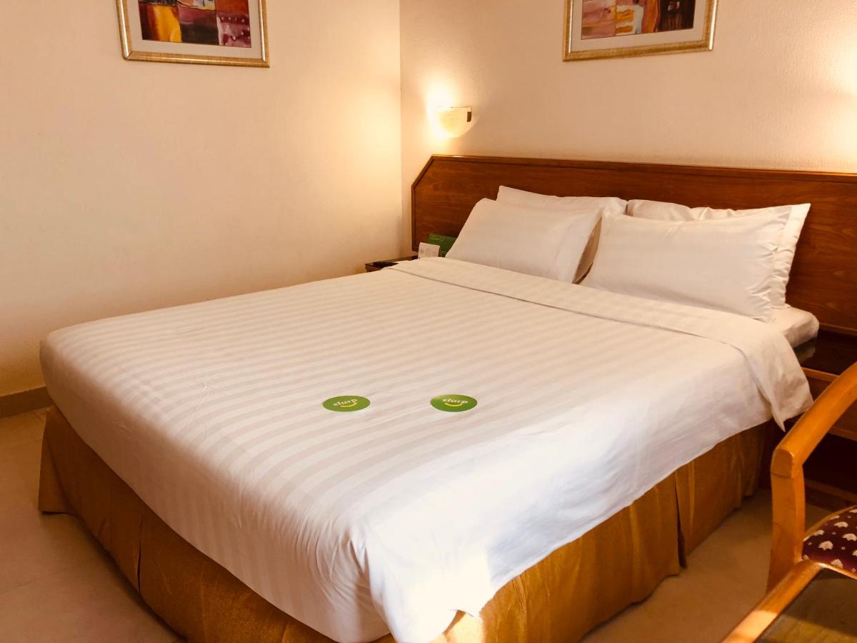 Hotel Al Madinah Holiday - Housity