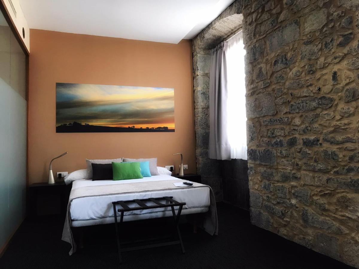 Cama o camas de una habitación en Hotel Balneario Orduña Plaza