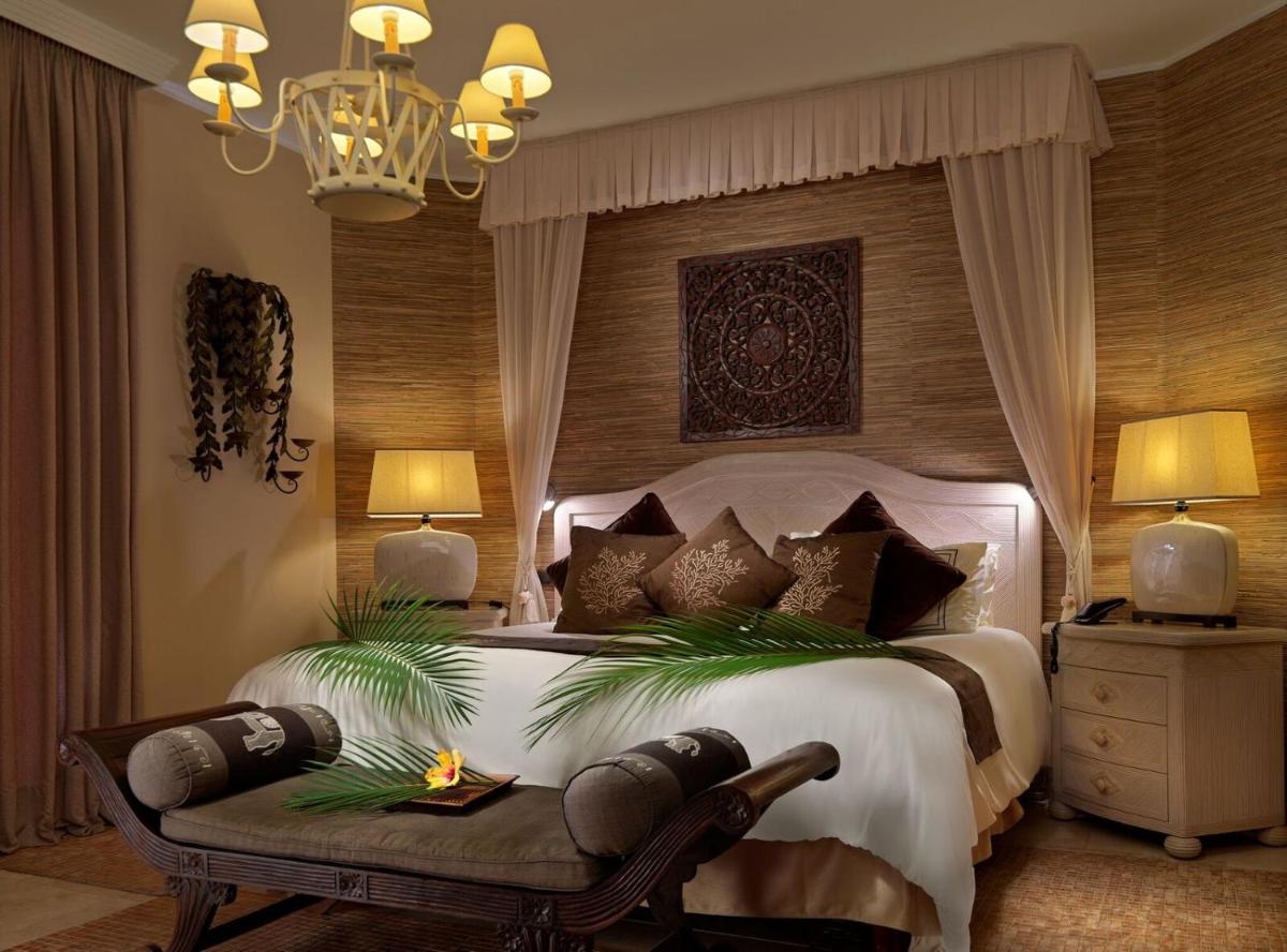 Cama o camas de una habitación en Royal Garden Villas, Luxury Hotel