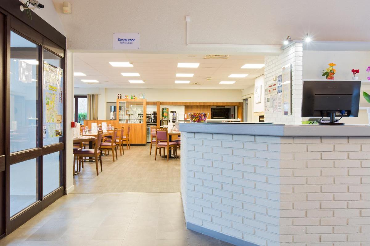 Comfort Hotel Etampes - Housity