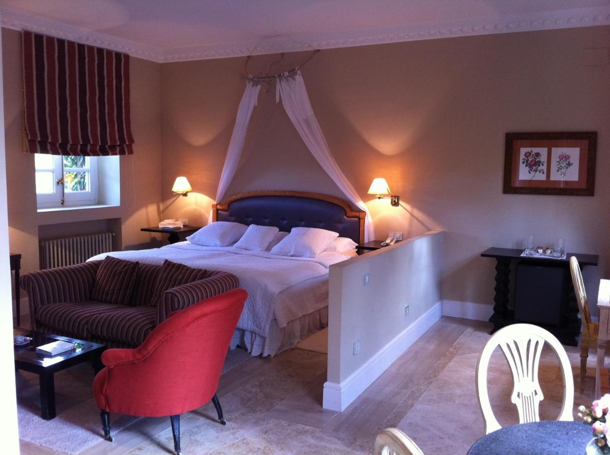 Cama o camas de una habitación en Hotel Valdepalacios Gourmand 5* GL