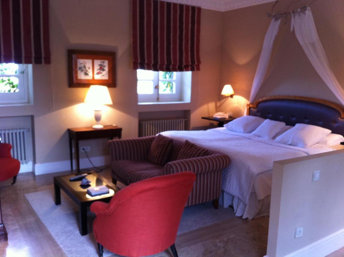 Cama o camas de una habitación en Hotel Valdepalacios Gourmand 5* GL