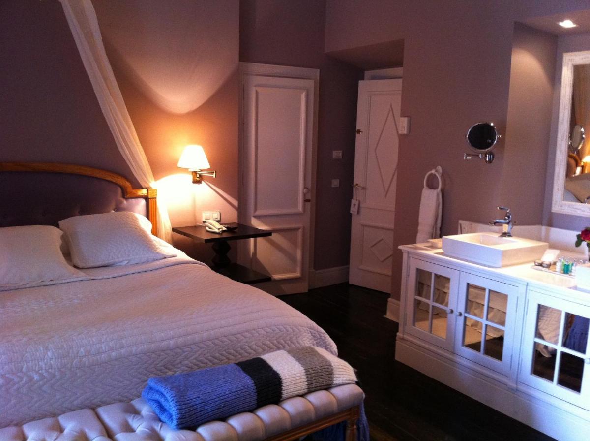Cama o camas de una habitación en Hotel Valdepalacios Gourmand 5* GL