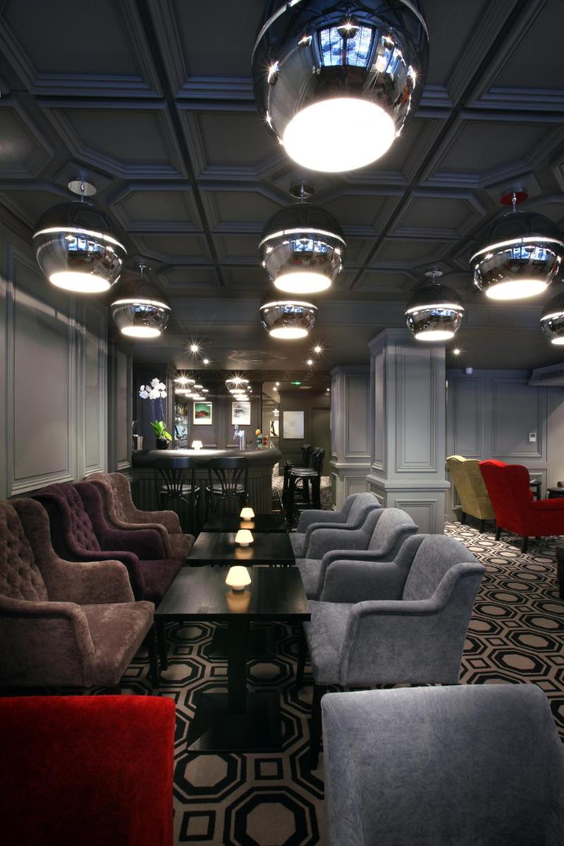 Coin salon dans l'établissement Hotel le Cinq Hyper - Centre