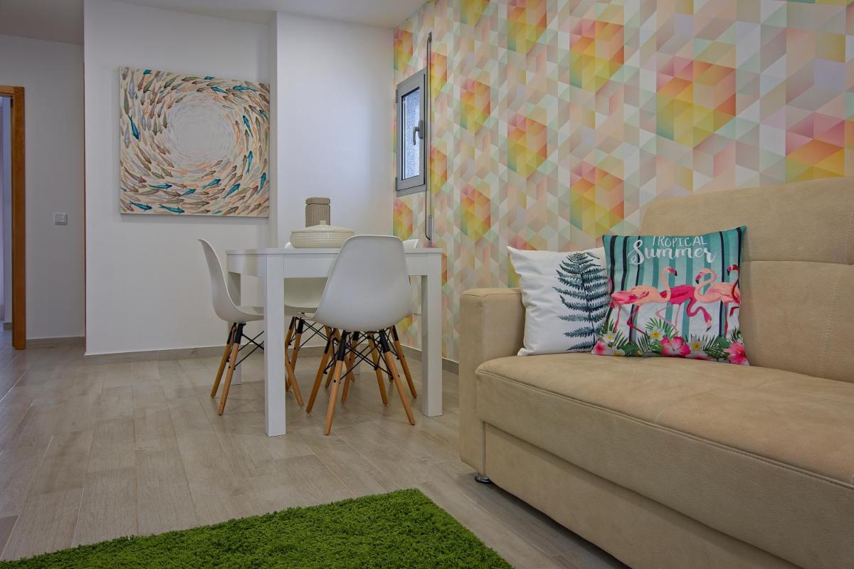 Carla Apartamentos - Housity