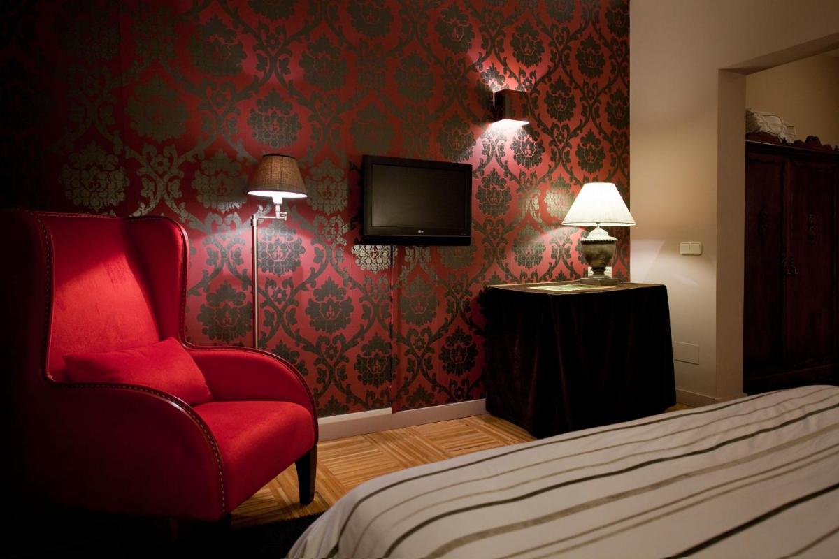 Cama o camas de una habitación en Hotel Cardamomo Sigüenza