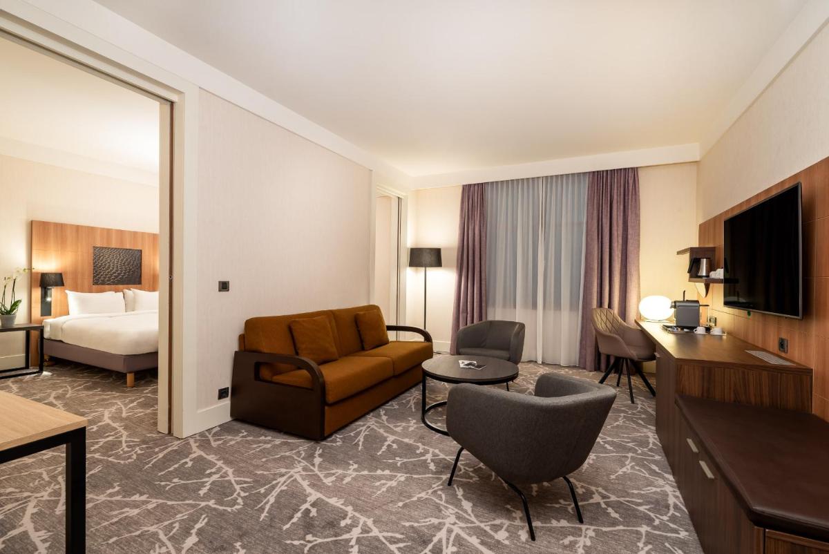 Télévision ou salle de divertissement dans l'établissement Hotel Paris Marne-la-Vallee by IHG