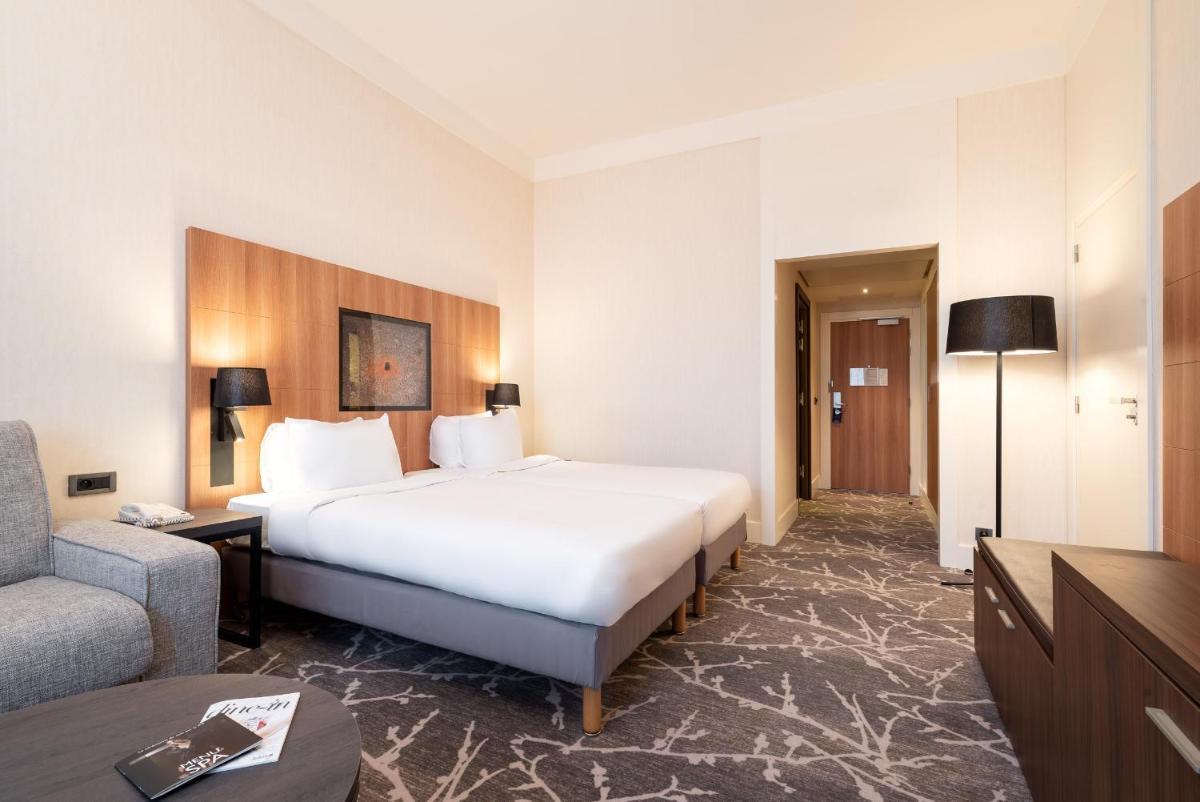 Un ou plusieurs lits dans un hébergement de l'établissement Hotel Paris Marne-la-Vallee by IHG