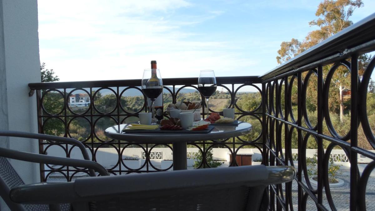 Uma varanda ou terraço em Aires da Serra Hotel