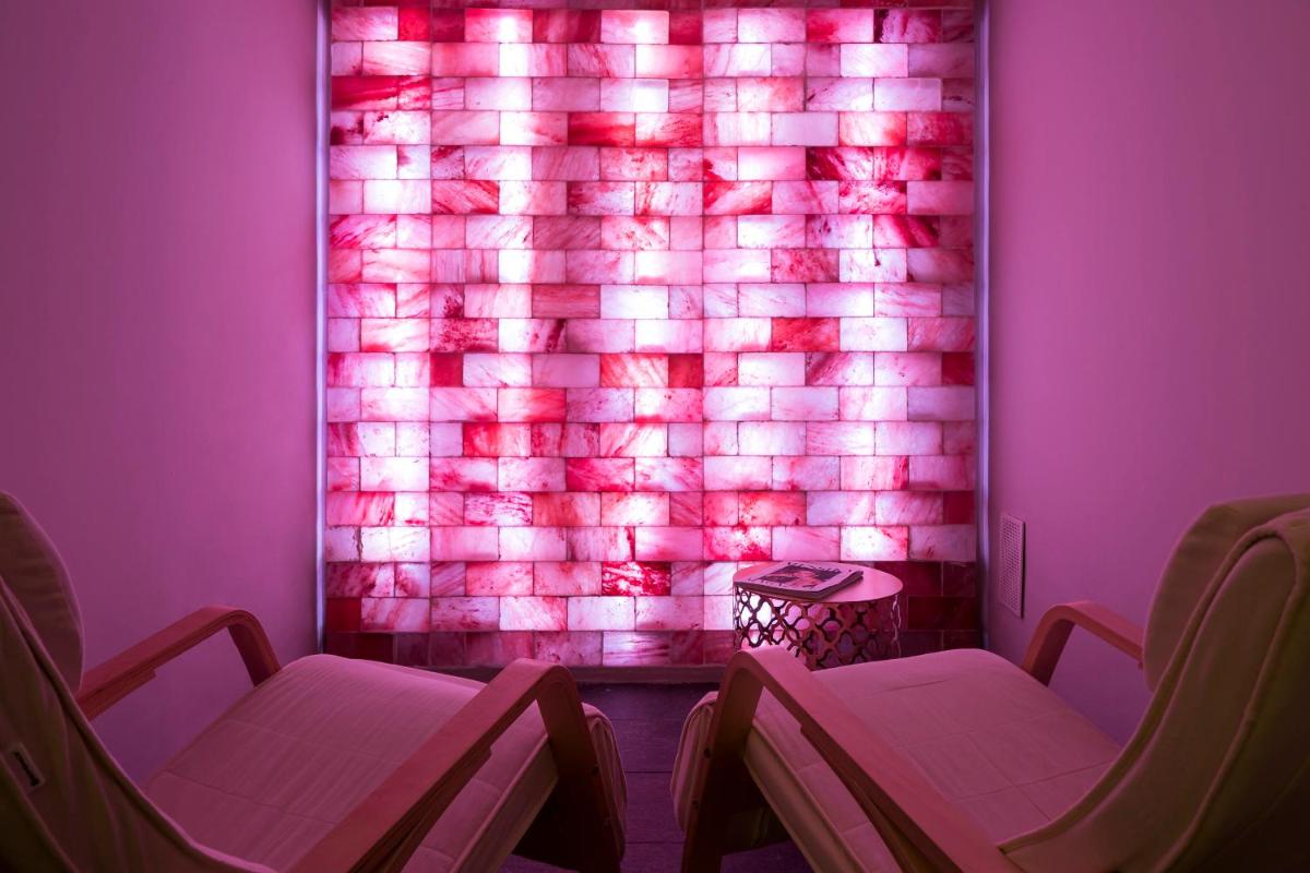 Coin salon dans l'établissement Grand Hôtel des Alpes