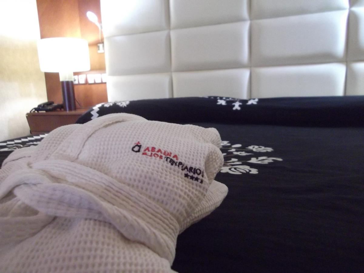 Cama o camas de una habitación en Hotel Termal Abadia de Los Templarios