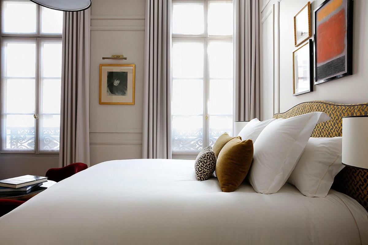Un ou plusieurs lits dans un hébergement de l'établissement Les Jardins du Faubourg Hotel & Spa by Shiseido