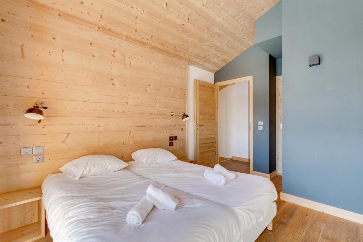Un ou plusieurs lits dans un hébergement de l'établissement TERRESENS - Les Fermes du Mont-Blanc