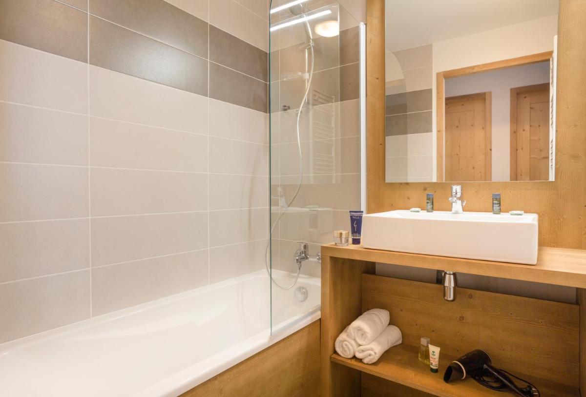 Salle de bains dans l'établissement Résidence Club MMV La Clé des Cimes
