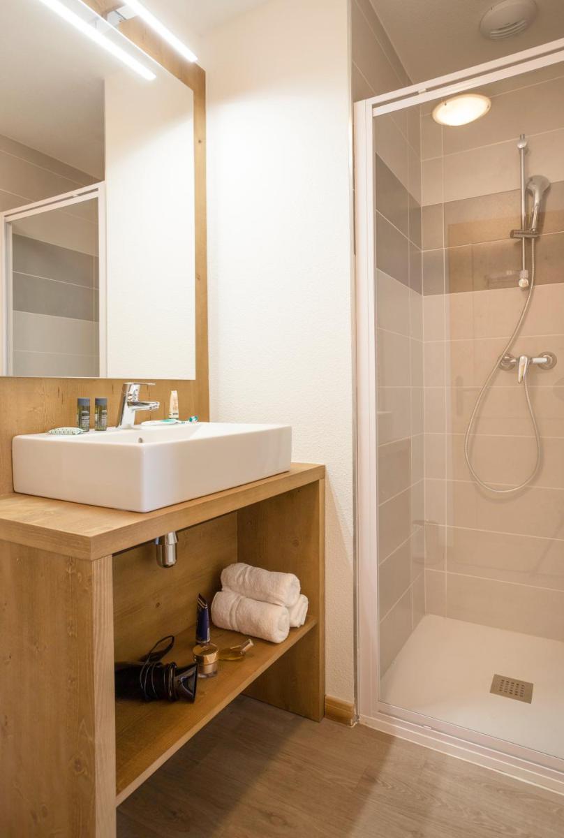Salle de bains dans l'établissement Résidence Club MMV La Clé des Cimes