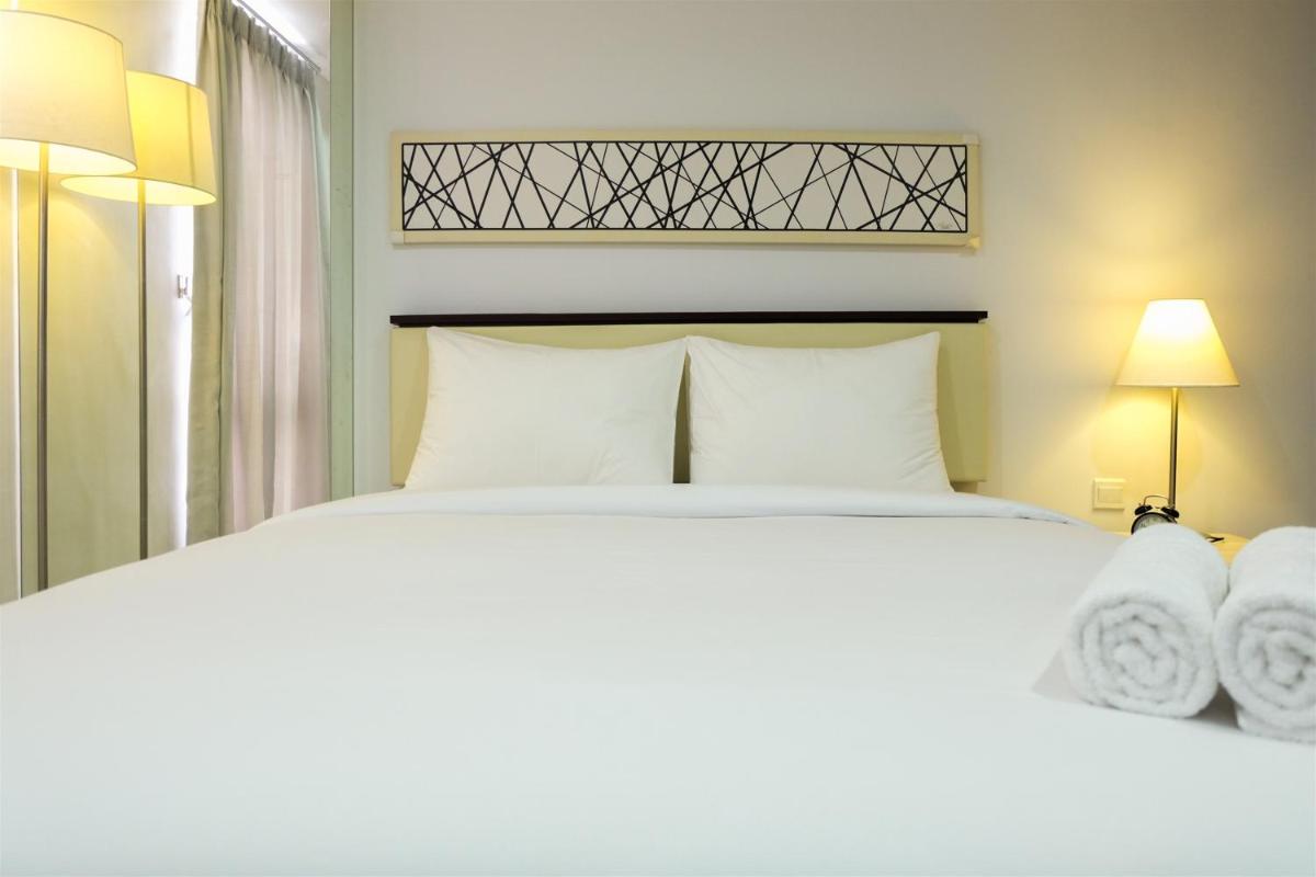 Studio Room Azalea Suites Apartment By Travelio - Housity