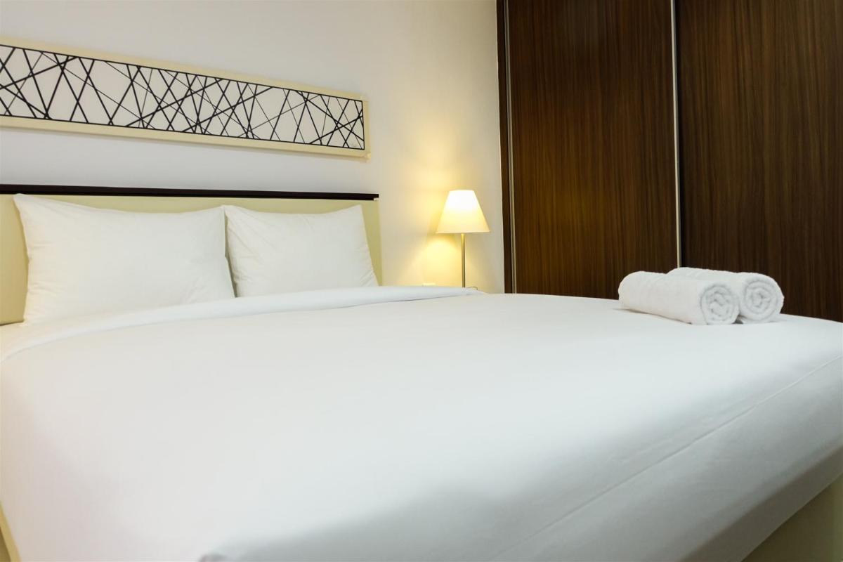 Studio Room Azalea Suites Apartment By Travelio - Housity