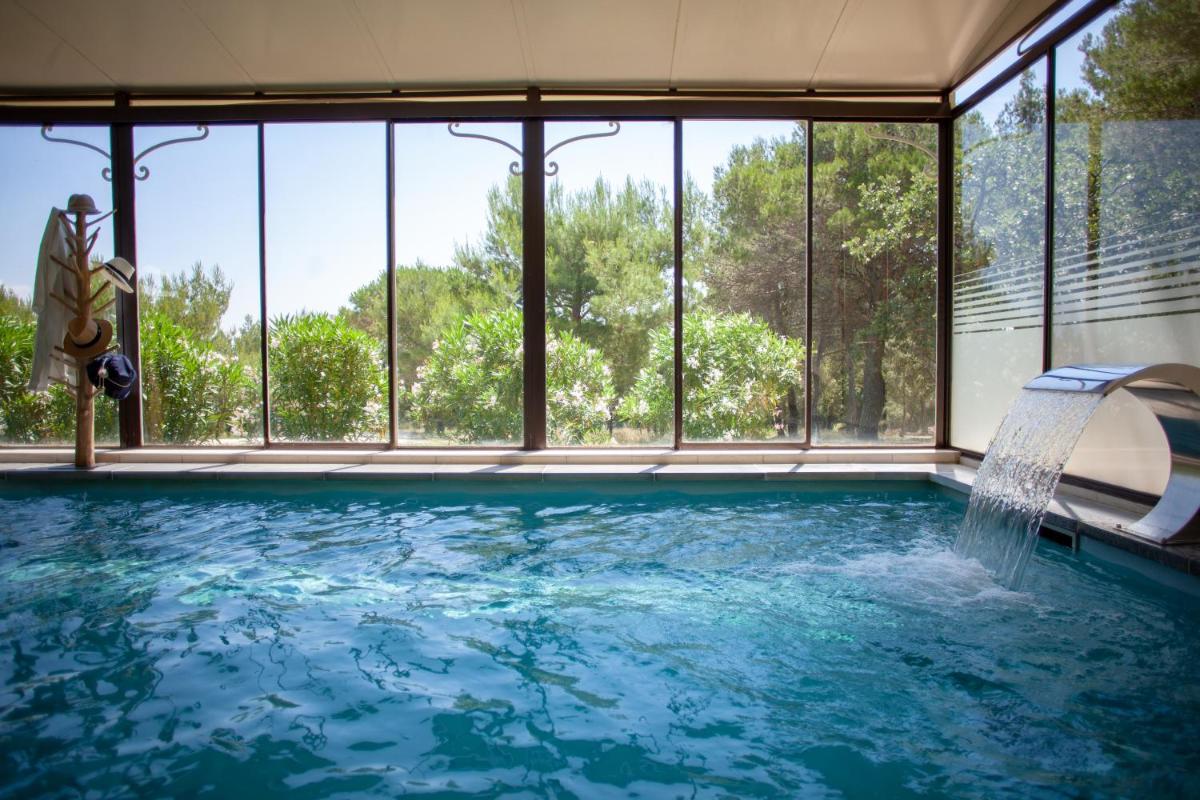 Piscine de l'établissement Le Phébus & Spa – Relais & Châteaux ou située à proximité