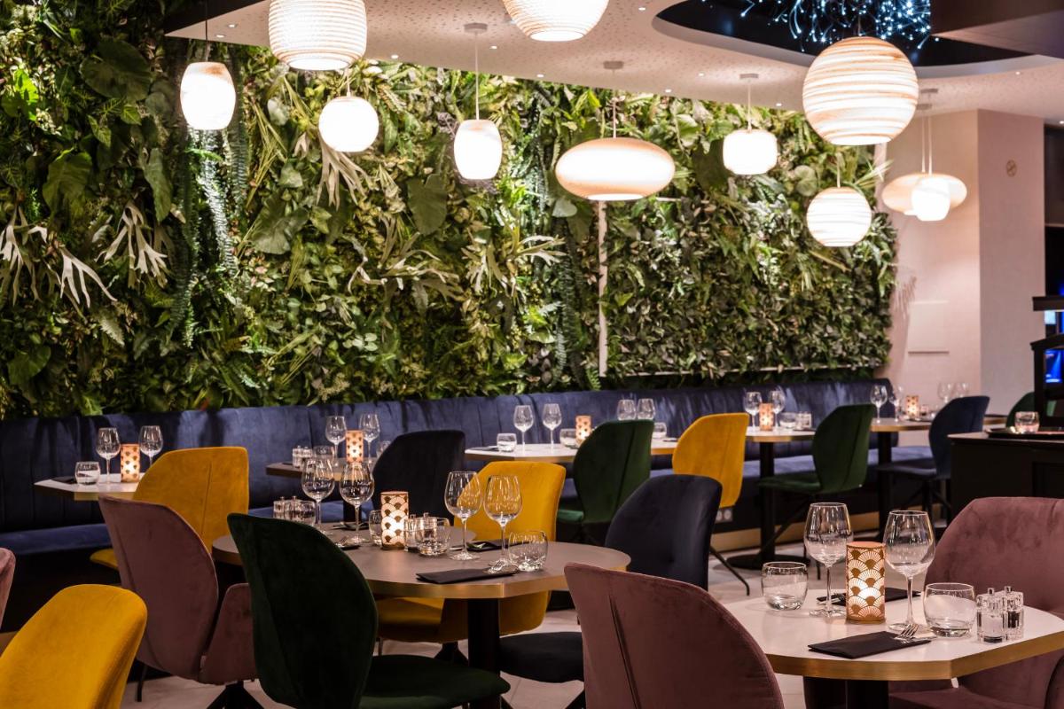 Coin salon dans l'établissement voco Strasbourg Centre - The Garden by IHG