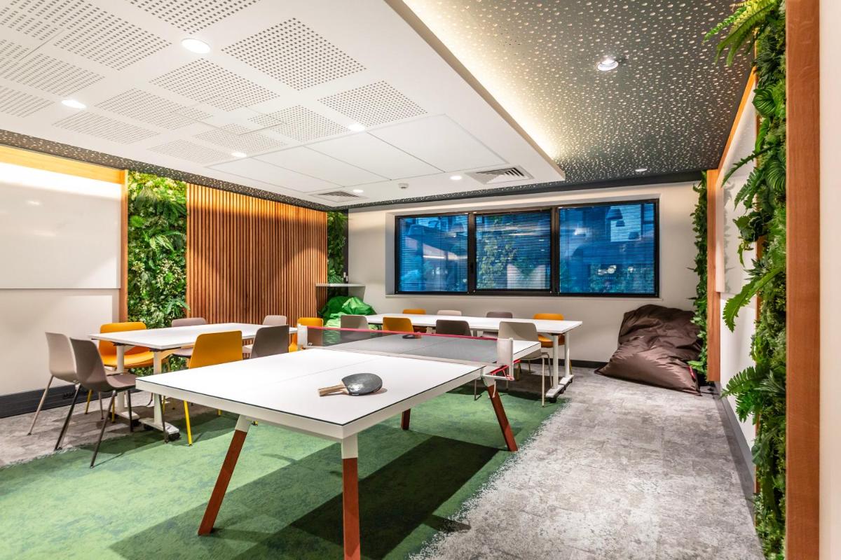 Coin salon dans l'établissement voco Strasbourg Centre - The Garden by IHG