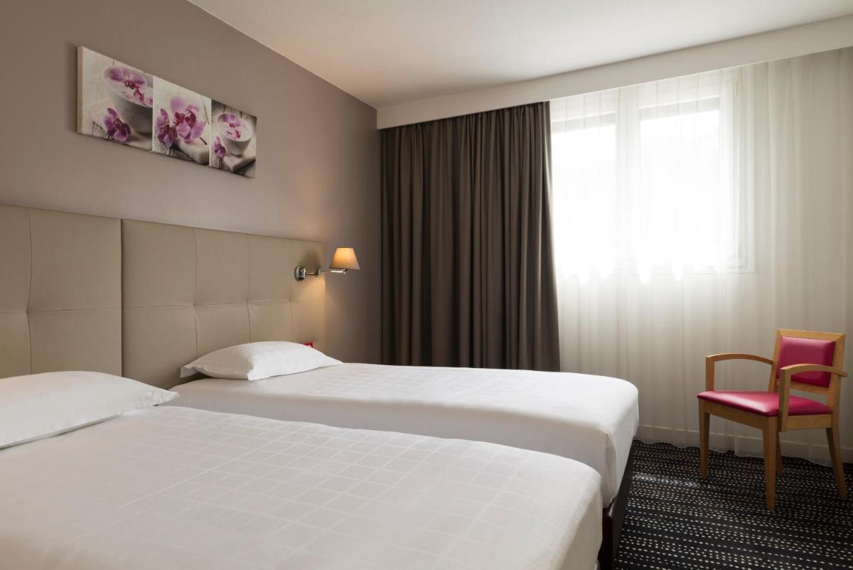BRIT HOTEL Confort Le Limouzi TULLE - Housity