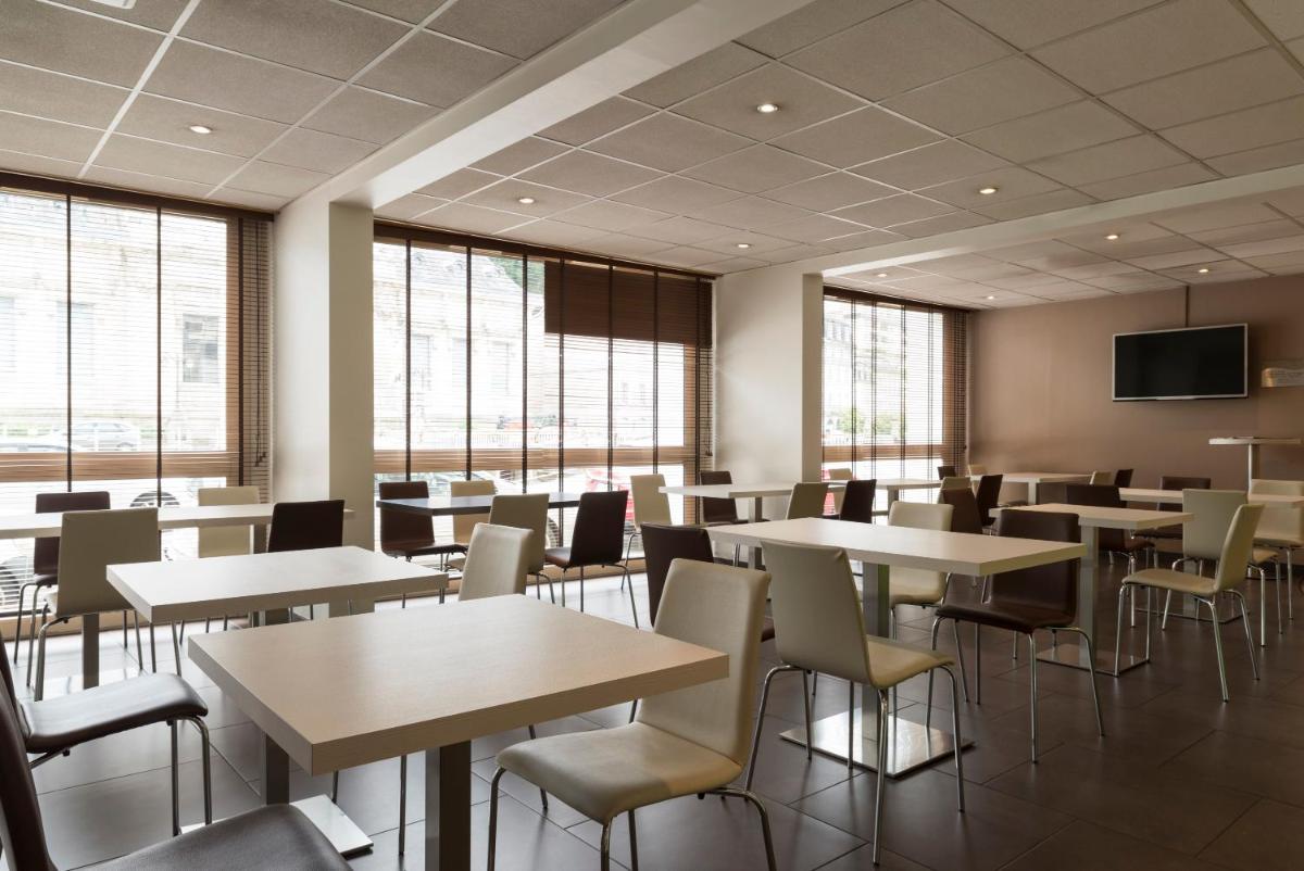 BRIT HOTEL Confort Le Limouzi TULLE - Housity
