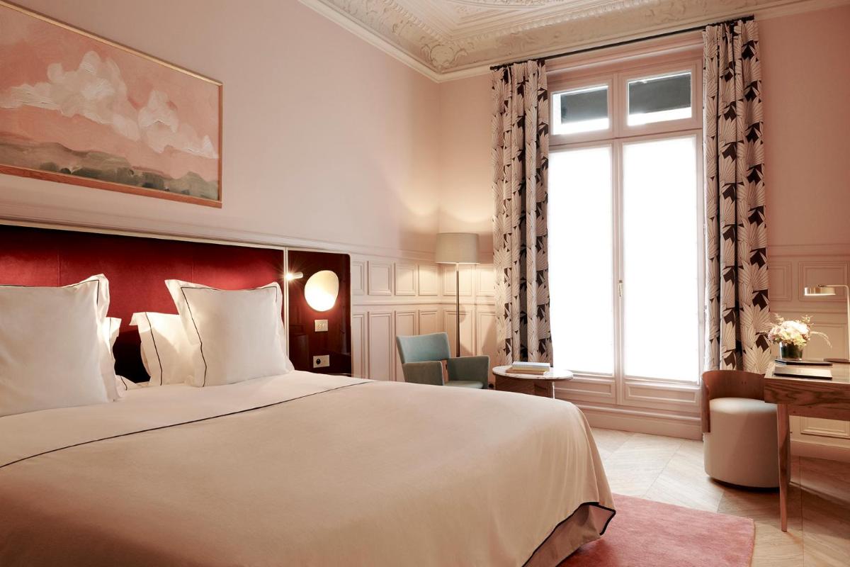 Un ou plusieurs lits dans un hébergement de l'établissement Grand Powers Hotel